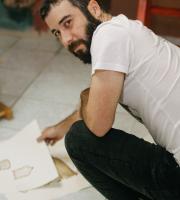 Who is Νίκος;